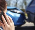 On the phone following a car accident