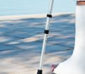 Man with broken leg by a swimming pool