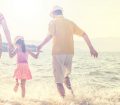 Couple and child on beach