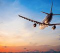 Airplane Taking People On Holiday, Flying Into The Sunset