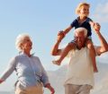 grandparents on the beach in summer