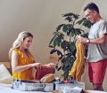 couple unpacking after holiday