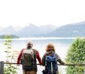 senior couple looking out over mounrtains