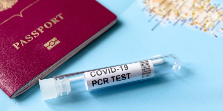 COVID-19 PCR test concept with passport