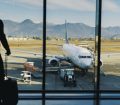 Passenger in airport waiting for flight