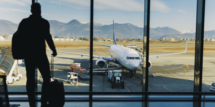 Passenger in airport waiting for flight