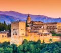 an image of Alhambra fortress in Granada, Spain at sunset