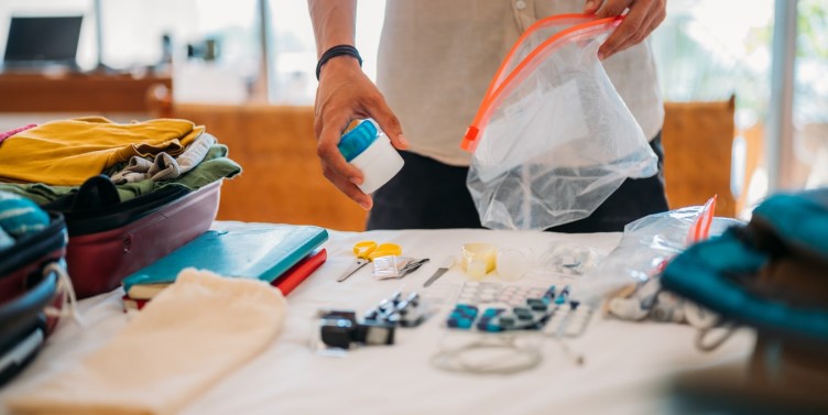 Packing medication for holiday in suitcase